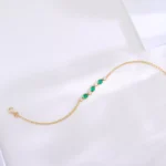 Delicate Oval Emerald and Diamond Station Bracelet in 18k Yellow Gold - Image 6