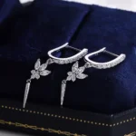 *Marquise and Round Moissanite Drop Earrings with Modern Spike Design - Image 3