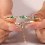 ​Emerald Halo Link Bracelet | Oval-Cut Emerald & Diamond Halo Bracelet in 18K Yellow Gold​ - Image 7