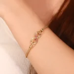 Two-Sided Infinity Buckle Pendant | 18K Gold Infinity Symbol with Diamond & Ruby Sides(pendant only) - Image 8