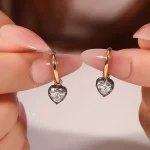 Heartbeat Studs | Heart-Cut Lab Diamond Earrings in 18K Yellow Gold with Contrast Black Prongs