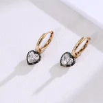 Heartbeat Studs | Heart-Cut Lab Diamond Earrings in 18K Yellow Gold with Contrast Black Prongs