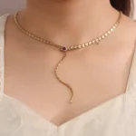 Serpent Lariat Necklace | 18K Gold Snake Necklace with Ruby Eye & Diamond Scales​ - Image 6