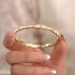 Step Harmony Bangle | 18K Yellow Gold Bangle with Rhythmic Diamond Accents - Image 3